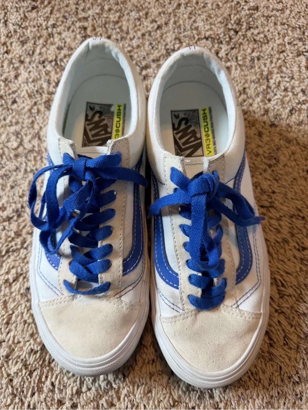 Vans white sneakers with blue stripe and laces